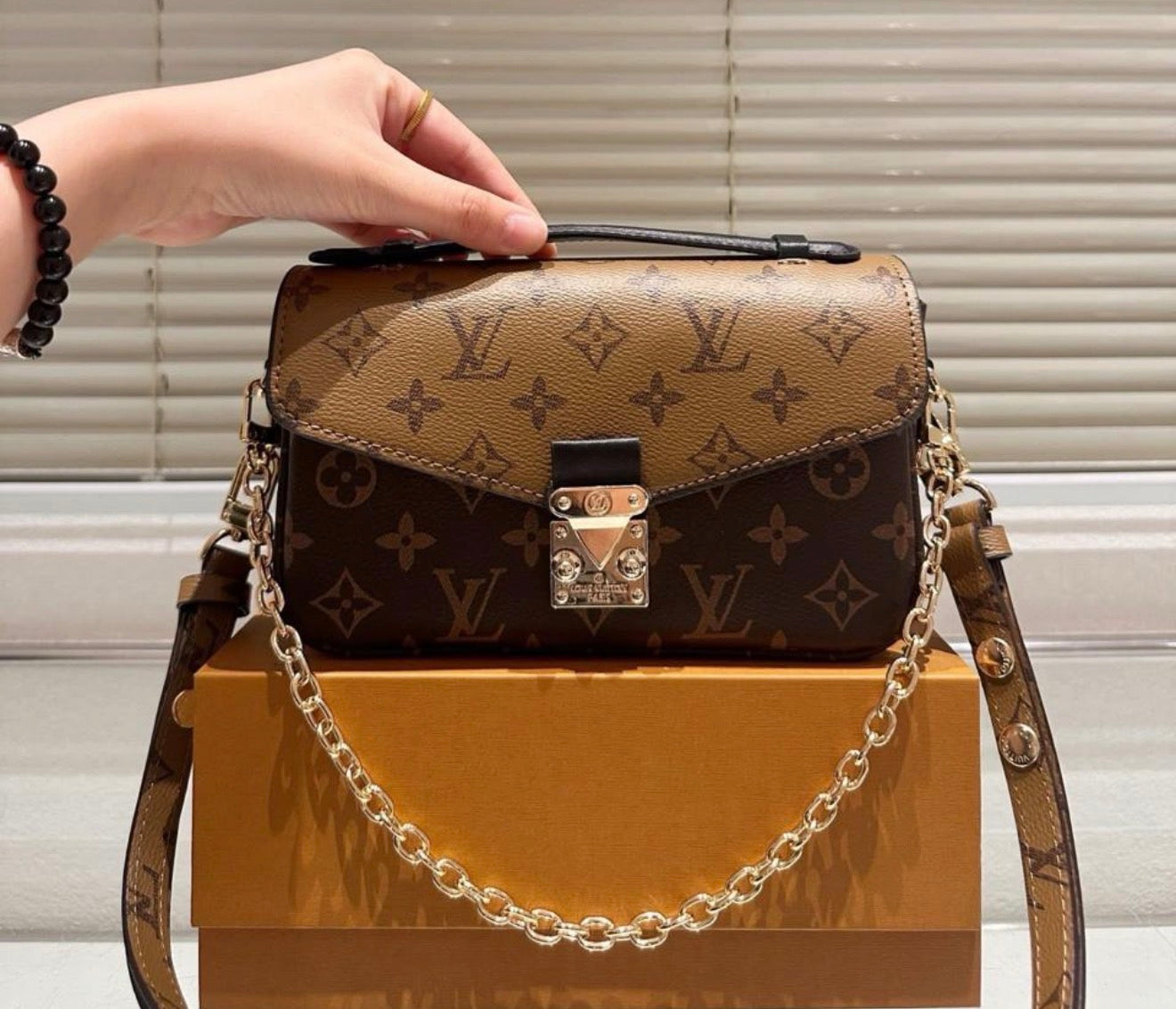 Louis Vuitton Pochette Métis East West Monogram Canvas